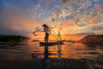 Fischer auf dem Mekong, Vietnam Rundreise